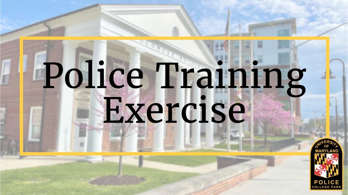 Photo of a building with the following text: Police Training Exercise and the UMPD patch logo